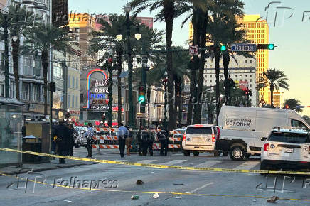 Police attend the scene where a pickup truck was driven into a large crowd on Bourbon Street