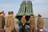North Korean leader Kim Jong Un Oversees Test-Fire of Controllable Shells for Multiple Rocket Launcher