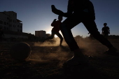 Young Yemenis play soccer in Sana'a