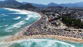 A drone view shows people enjoying the Macumba beach, during a heatwave in Rio de Janeiro