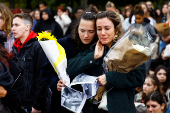 Fans gather and place tributes to former One Direction singer Liam Payne in Paris