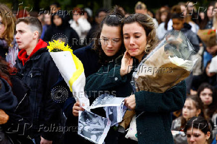 Fans gather and place tributes to former One Direction singer Liam Payne in Paris