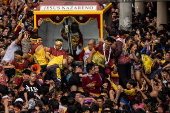 Filipino Catholic devotees parade 