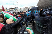 Pro-Palestinian activists clash with police during a protest against G7 meeting on Capri Island, in Naples