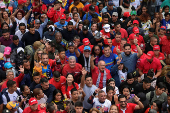 Government supporters participate in a march in support of Venezuelan President Nicolas Maduro?s victory in the July 28 elections, in Caracas