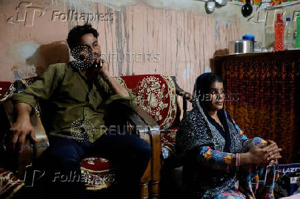 Tofik and Nasreen are pictured at their residence in Loni town in the northern state of Uttar Pradesh