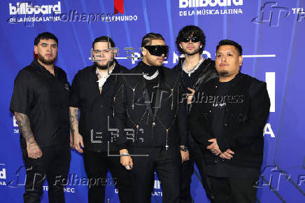 El negro y los diseos clsicos intervenidos dominaron la alfombra de los Latin Billboards