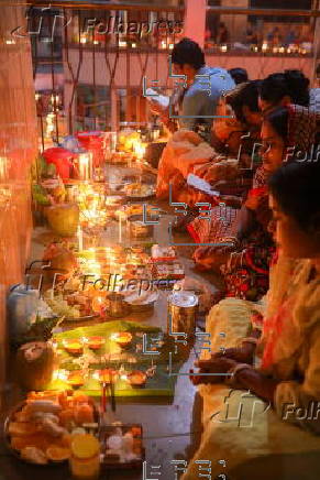 Hindu devotees take part in Rakher Upobash ritual, in Dhaka