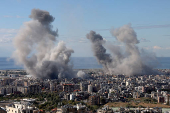 Smoke billows in Beirut's southern suburbs, after an Israeli strike