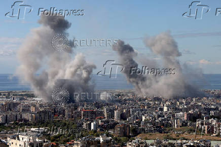 Smoke billows in Beirut's southern suburbs, after an Israeli strike