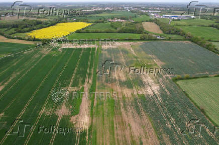 A drone view of fields that have been partially flooded in La Rocheserviere