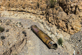 A drone view of the apparent remains of a ballistic missile, as it lies in the desert following a massive missile and drone attack by Iran on Israel, near the southern city of Arad