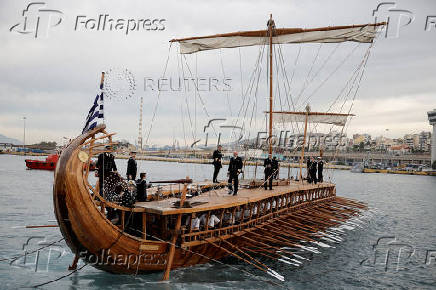 The Olympic flame departs Greece on the sailing ship Belem for the 2024 Paris Games, in the port of Piraeus