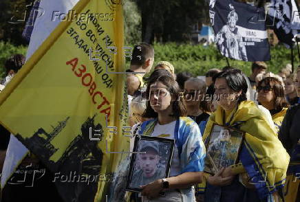 Ukrainians take part in procession for the 'Day of Defenders of Ukraine' in Kyiv