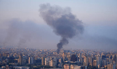 Smoke billows over Beirut's southern suburbs, amid the ongoing hostilities between Hezbollah and Israeli forces