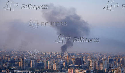 Smoke billows over Beirut's southern suburbs, amid the ongoing hostilities between Hezbollah and Israeli forces