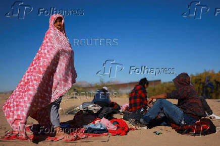 Migrants seeking asylum in the United States gather on the banks of the Rio Bravo river in Ciudad Juarez