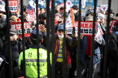 Pro-Yoon protesters participate in a rally outside a court, in Seoul