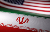 Illustration shows U.S. and Iranian flags