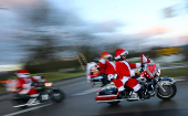 Riding Santas take part in their 10th Harley Davidson motorcycle ride near Neustadt an der Weinstrasse