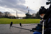 U.S. President Joe Biden and Jill Biden arrive on the South Lawn of the White House