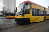 A tram with a European Union flag drives in Warsaw