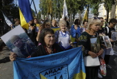 Ukrainians take part in procession for the 'Day of Defenders of Ukraine' in Kyiv