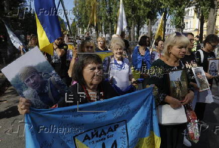 Ukrainians take part in procession for the 'Day of Defenders of Ukraine' in Kyiv