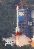 A Long March-3B carrier rocket carrying a new experimental satellite for communication technology blasts off from the Xichang Satellite Launch Center