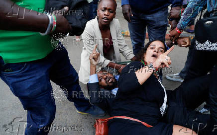 Kenyan activists and civil society representatives gather to deliver a list of people who disappeared during demonstrations against the government proposed tax hikes, in Nairobi