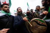 Celebrations in Paris after Syrian rebels capture Damascus and overthrow al-Assad