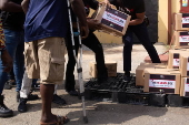 Boxes of supplies are distributed to the poor in Lagos