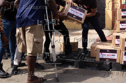 Boxes of supplies are distributed to the poor in Lagos