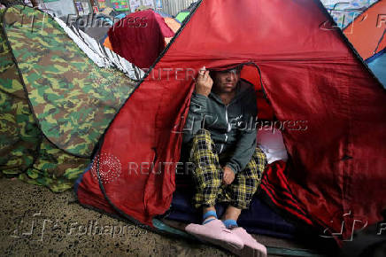 Tears and shock as Trump dashes dreams of migrants in Mexico scheduled to enter US