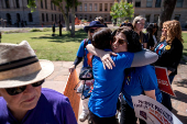 Abortion rights activists Marion Weich and Carolyn LaMantia embrace in Phoenix