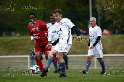 French President Macron participates in the Varietes Club charity football match, in Plaisir