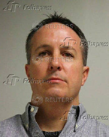 FILE PHOTO: The Wrentham Police Department booking photo of Barry Cadden