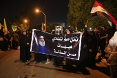 Supporters of Hezbollah Brigades protest against the killing of Nasrallah, in central Baghdad