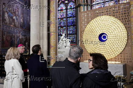 French President Macron visits Notre-Dame in Paris