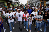 Families of four boys found dead hold vigil, in Guayaquil