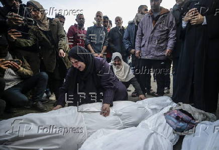 Palestinians mourn their dead at Deir Al Balah hospital after Israeli airstrike in central Gaza