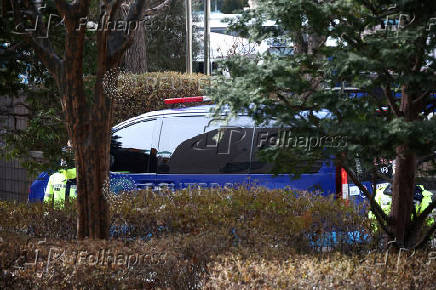 A motorcade believed to be carrying South Korea's impeached President Yoon Suk Yeol arrives at a court, in Seoul