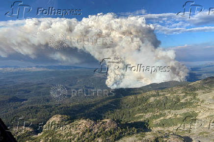 FILE PHOTO: Smoke rises from the Young Creek wildfire (VA1735) in Tweedsmuir Provincial Park