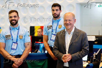 German Chancellor Scholz visits the international police centre, in Neuss