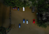 A drone view shows stranded vehicles at White Mills Marina after heavy rain and flooding in Northampton