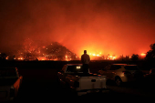 Smoke billows from the Mountain Fire, in California