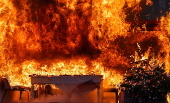 Fire department in Berlin demonstrates fire hazard from Christmas tree candles