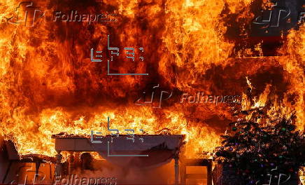 Fire department in Berlin demonstrates fire hazard from Christmas tree candles