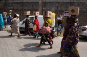 Boxes of supplies are distributed to the poor in Lagos