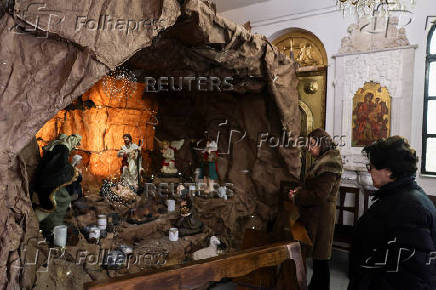 Faithful celebrate Christmas, following the ousting of Syria's Bashar al-Assad, in Damascus